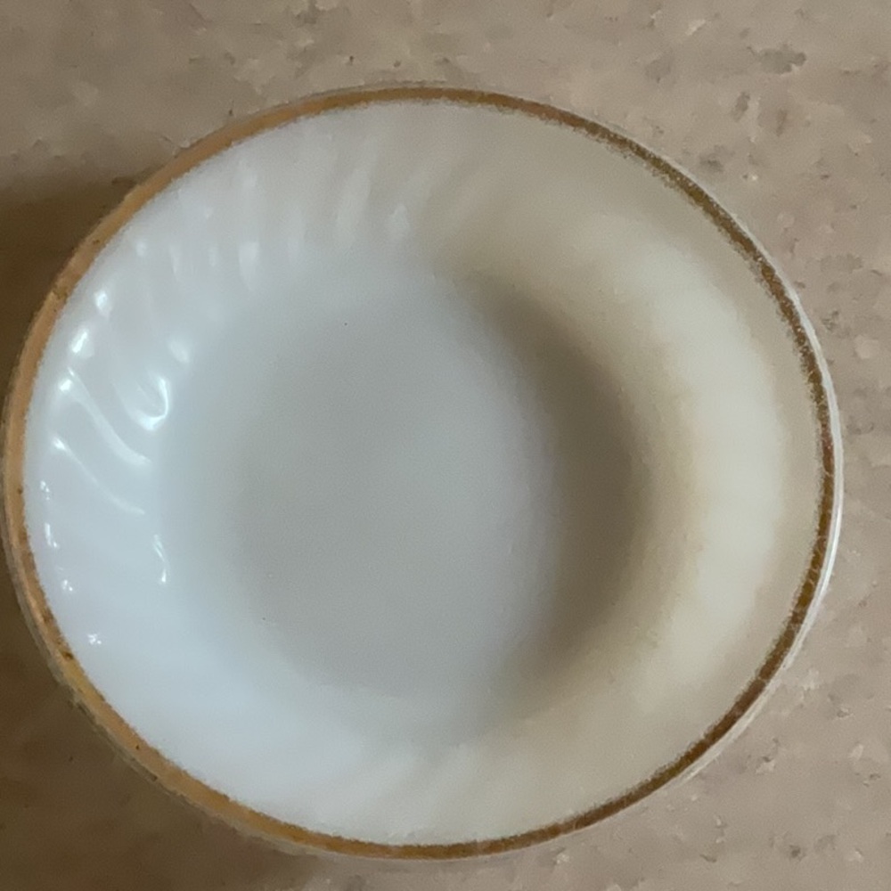 Fire King milk glass swirl bowl.
